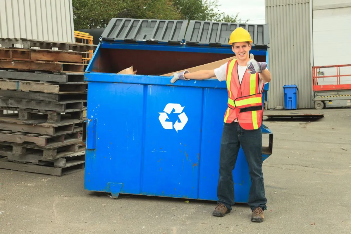 commercial dumpster contractor smiling